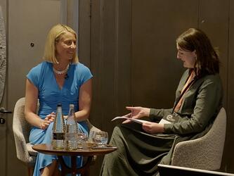Kelly Beaver on stage at the MRS Data-Driven Insights Conference in July 2025, pictured with Katie McQuater